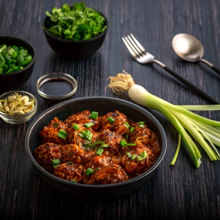 (Grill Inn2) Veg Manchurian - Semi Gravy