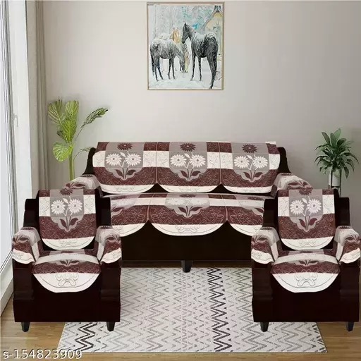 Name : Mebels Joy sofa cover set 5 seater with hands arms cover set of 16 pieces brown colour (3+1+1)Fabric : Cotton BlendNo. of Sofa Back Covers : 8No. of Sofa Seat Covers : 8Print or Pattern Type : FloralSet : Sofa SetShape : 3+1+1Type : Tie BackProduct Breadth : 29 InchProduct Height : 0 InchProduct Length : 69 InchNet Quantity (N) : 1The Pack contains 16 pieces of sofa cover se